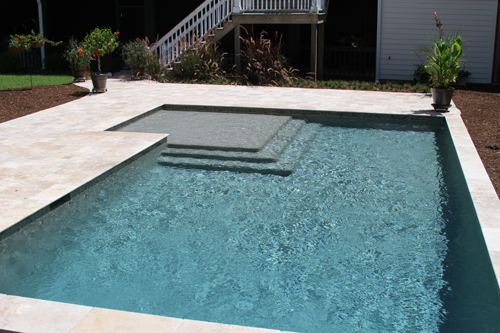 Geometric Swimming Pool with Sun Ledge and Umbrella Hole | Aqua Blue Pools