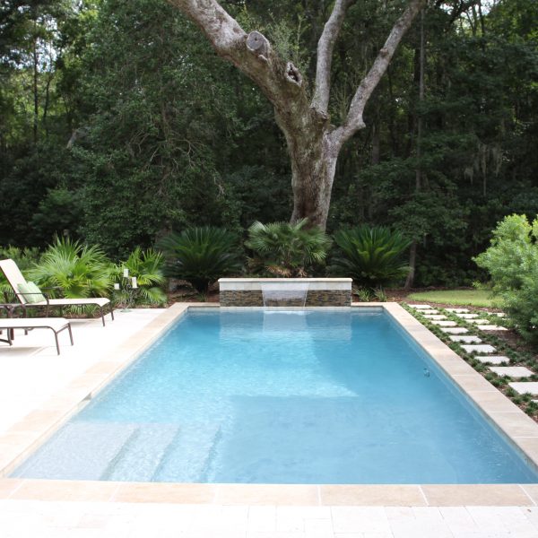 Geometric Pool with Steps and Custom Water Feature