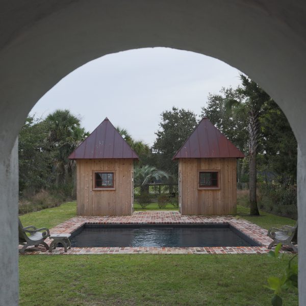 Custom Inground Geometric Pool with Brickwork Surround Arch View