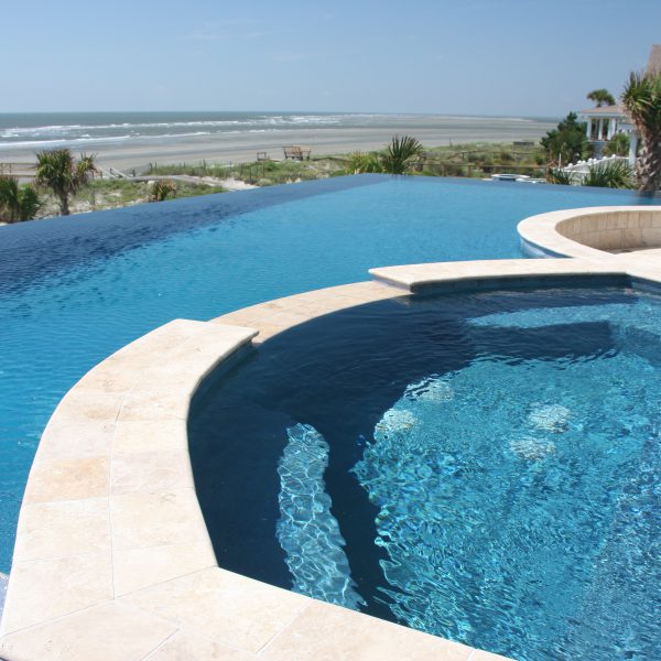 Infinity Pool with custom spa overlooking the beach