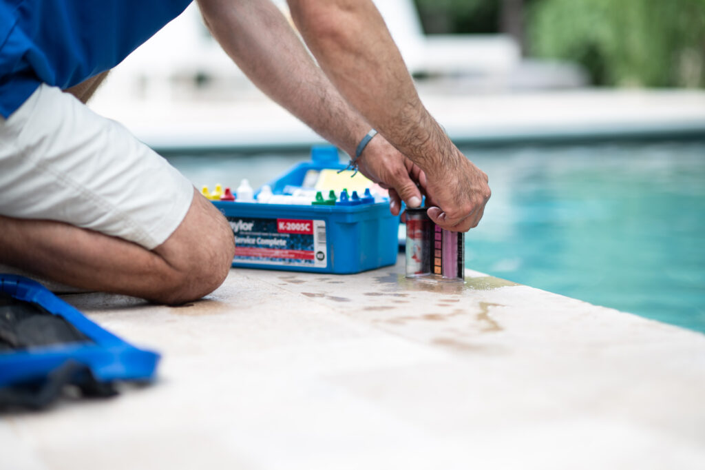 Aqua Blue Pools testing chemicals in pool