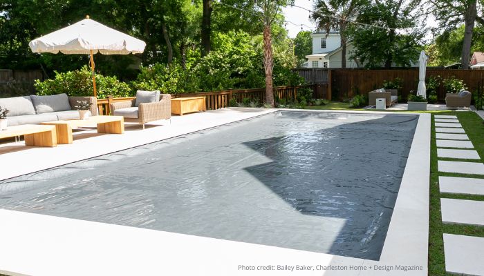 Backyard pool with cover on it